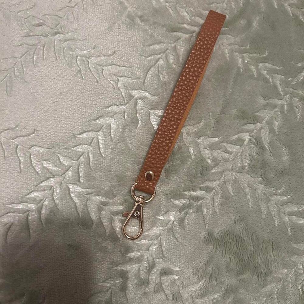 Brown fake leather wristlet